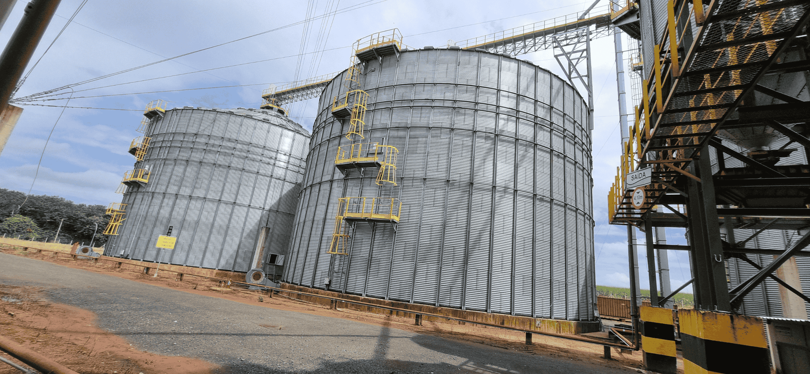 Large industrial corn storage silos for sustainable ethanol production in Brazil.